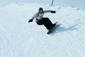 Snowboarding down an inclined plane