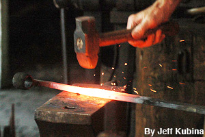 Pounding the red-hot metal