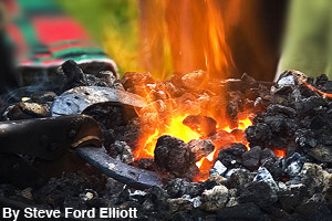 Heating the metal for a horseshoe