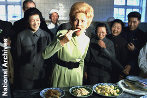 Tasting food on her trip to China