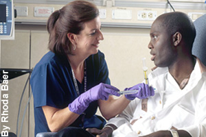A nurse helping a patient feel better