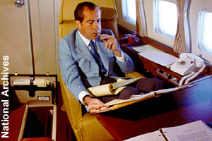 Nixon working on Air Force One, <br>the president's plane