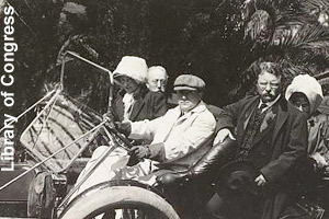 Roosevelt riding in a car