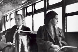 Rosa Parks riding a bus <u>after</u> the <br>successful boycott