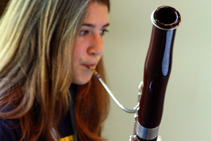 Blowing into a bassoon