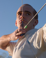 Aiming an arrow at a target