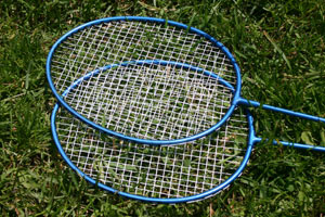 Two badminton rackets